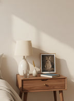 Vintage Portrait Bunny Floral Crown art print shown in a small bedside oak setting