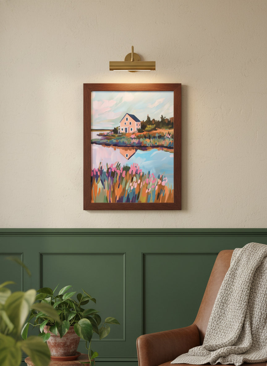 Colorful Lakeside Cottage Painting art print shown in a forest green walnut setting