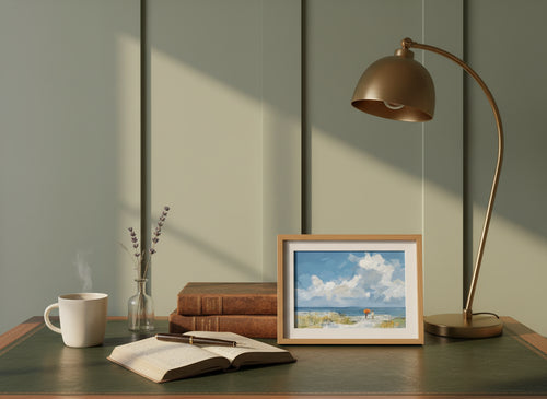 Beach Figures Coastal Painting art print shown in a small desk oak setting