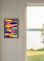 Colorful School Of Fish Art art print shown in a shiplap blurred view setting