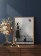 Woman Black Cat Heart Art art print shown in a dresser dried florals setting