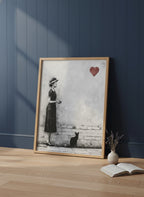 Woman Black Cat Heart Art art print shown in a navy paneled oak setting