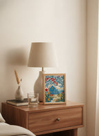 Folk Art Coastal Cottage Floral art print shown in a small bedside oak setting
