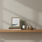 Minimalist Coastal Dune Art art print shown in a small bookshelf brass setting