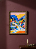 Colorful Alpine Ski Village Art art print shown in a burgundy brass setting