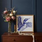 Blue Loon Bird Etching Art art print shown in a dresser dried florals setting