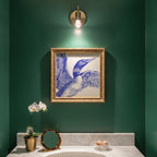 Blue Loon Bird Etching Art art print shown in a square powder room emerald setting