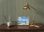 Woman on Beach Ocean Art art print shown in a small desk oak setting