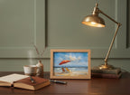 Beach Chairs Umbrella Ocean Painting art print shown in a small desk oak setting