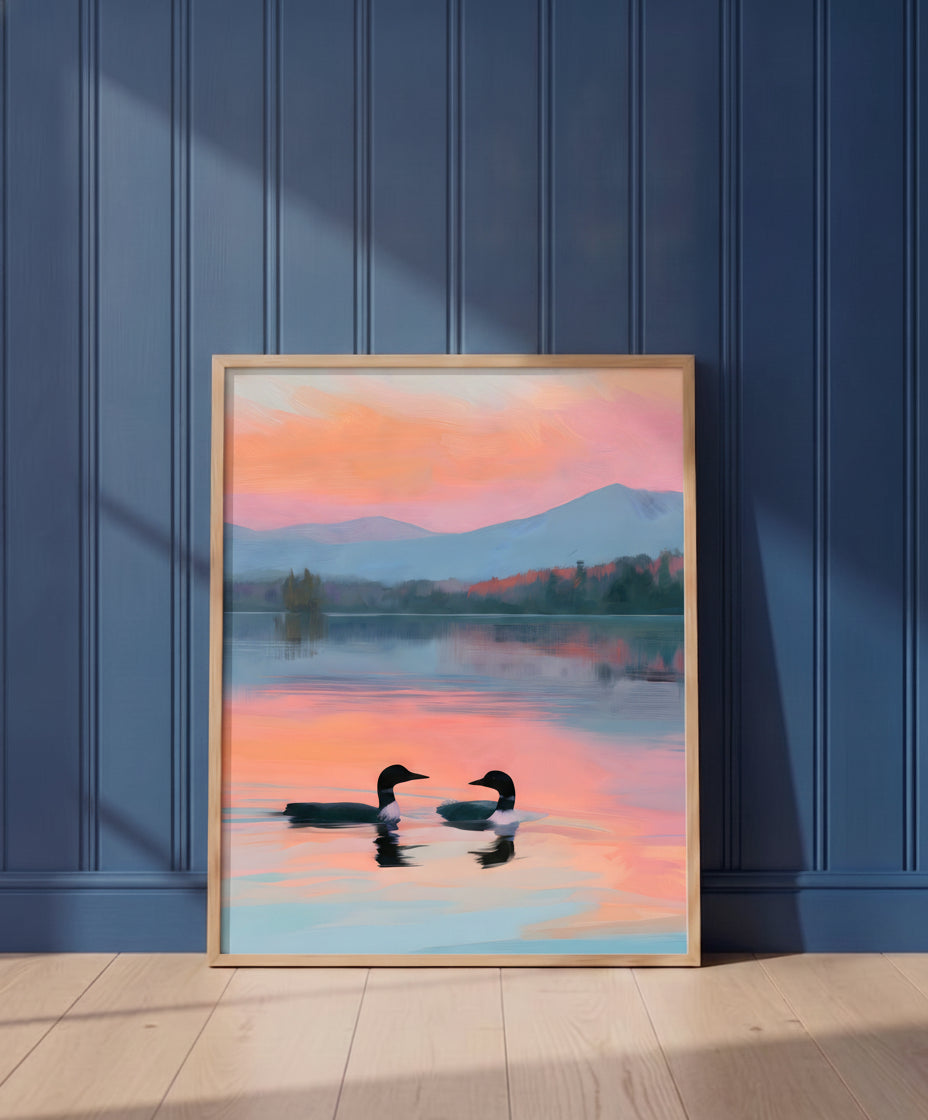 Loon Pair Sunset Lake Art art print shown in a blue wall paneled setting