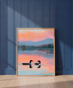 Loon Pair Sunset Lake Art art print shown in a blue wall paneled setting