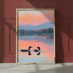 Loon Pair Sunset Lake Art art print shown in a red setting