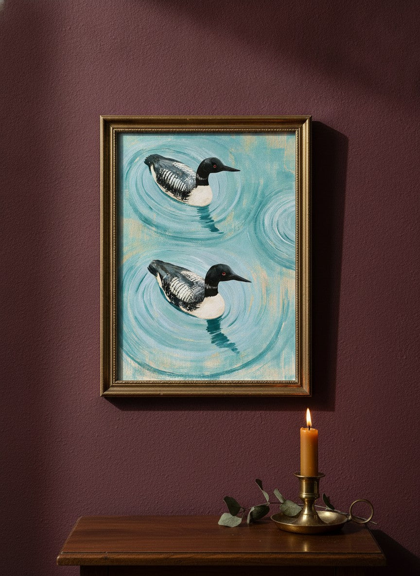 Common Loon Pair Painting art print shown in a burgundy brass setting