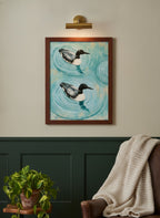 Common Loon Pair Painting art print shown in a forest green walnut setting