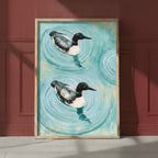 Common Loon Pair Painting art print shown in a red setting