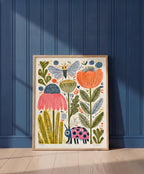 Folk Art Garden Botanical Print art print shown in a blue wall paneled setting