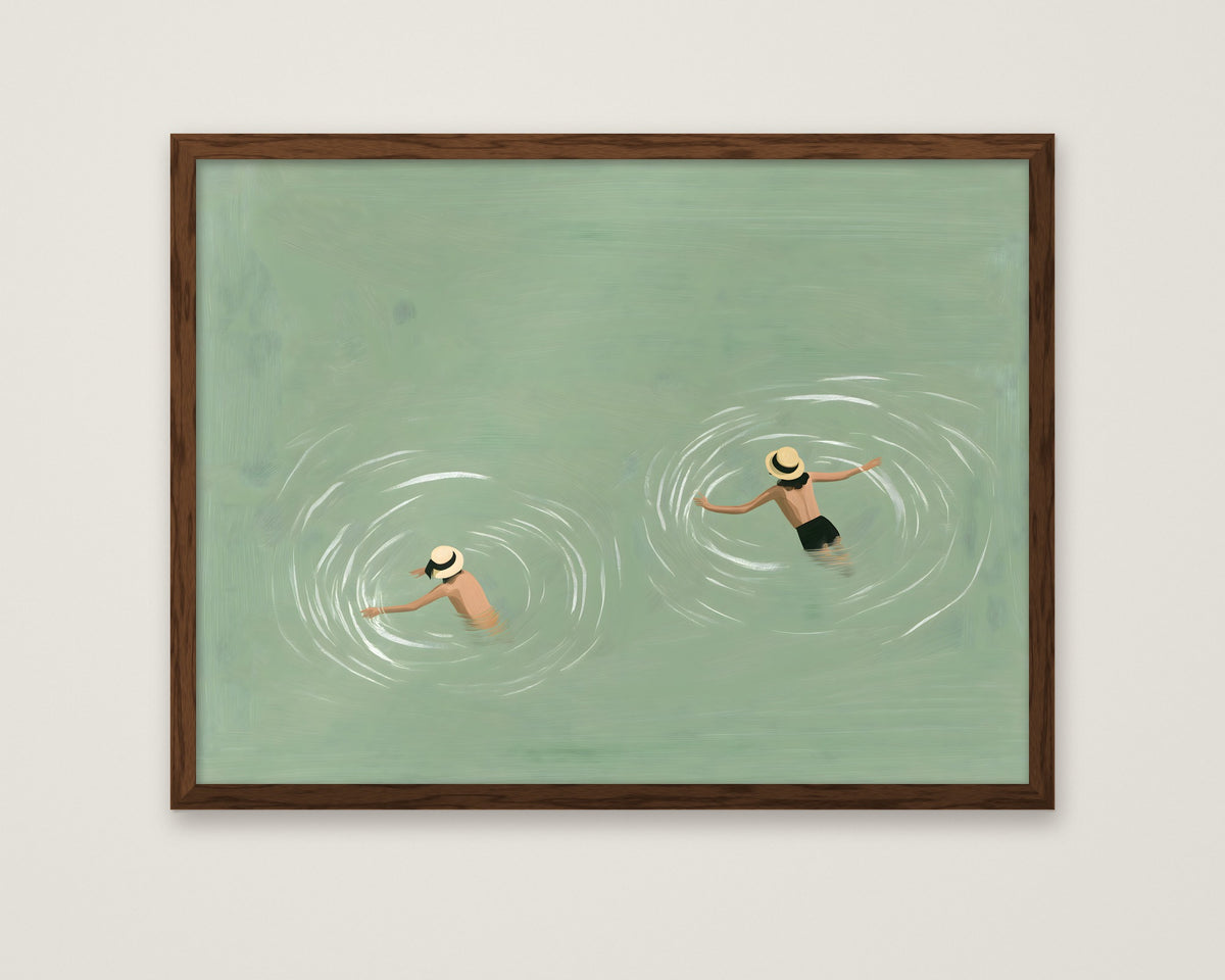 Swimmers Sage Green Wall Art in a dark wood frame